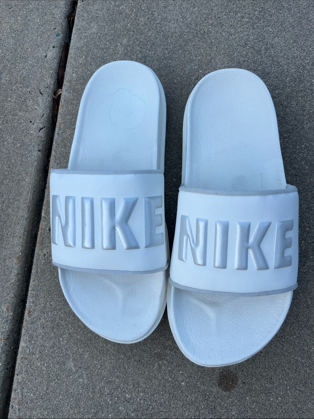 Nike White  Slide Sandals with Embossed Logo